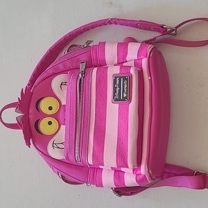 Disney Loungefly Alice in Wonderland Cheshire Cat mini backpack.